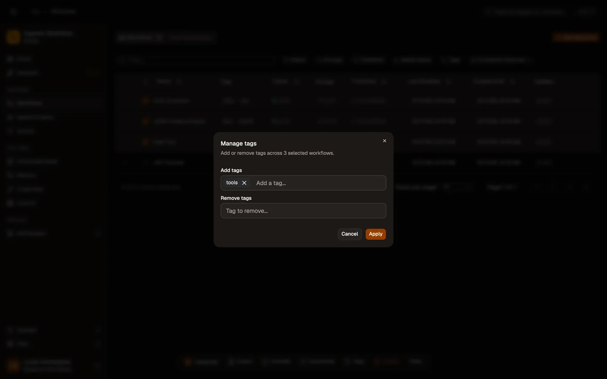 The Manage tags dialog opened from the bulk-action toolbar for 3 selected workflows: an Add tags field holding the tag tools, an empty Remove tags field, and Cancel and Apply buttons.